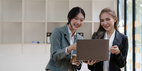 Female office worker business suit working together with friends in office, successful and agreement concept