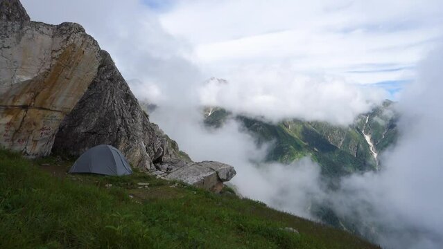 July 14th 2022, Himachal Pradesh India. Tents and camps with beautiful landscapes, valley and mountains in the background. Shrikhand Mahadev Kailash Yatra in the Himalayas.