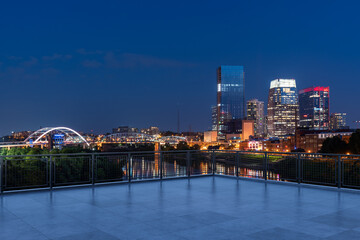 Skyscrapers Cityscape Downtown, Nashville Skyline Buildings. Beautiful Real Estate. Night time. Empty rooftop View. Success concept.