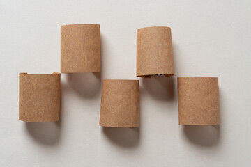 five abstract 3d paper (sticker labels) objects viewed from the top