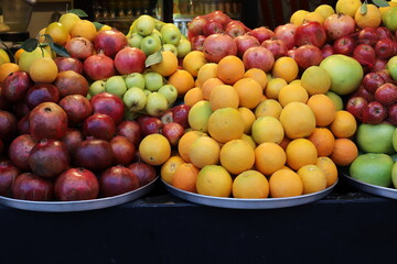 Fresh vegetables and fruits are sold at a bazaar in Israel.