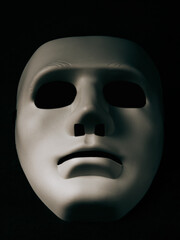 A white mask on a black background is the symbol of the attacking hacker group, this mask is a well-known symbol for anonymous online hacktivist group.copy space.