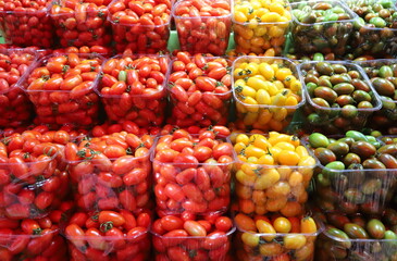 Fresh vegetables and fruits are sold at a bazaar in Israel.