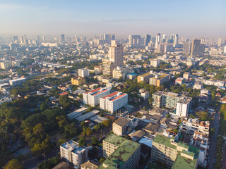 Fototapeta premium Aerial view metropolitan city office building morning sky