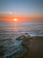 Aerial sunset scene of Capela do Senhor da Pedra Catholic church in Vila Nova de Gaia, Portugal
