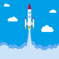 Fototapeta premium 新しい挑戦のスタートです。絵本に出てくるようなレトロなロケットが大空に向かって打ち上げられています。