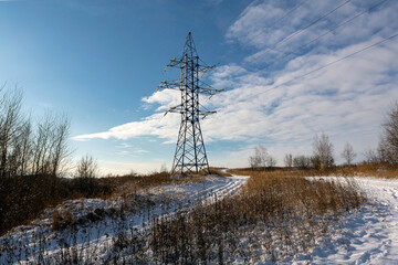 Power lines on a snow-covered field Moscow region Russia