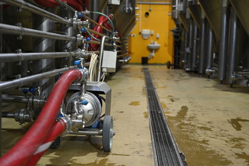 Photo of faucets and hoses in food production - 549361932