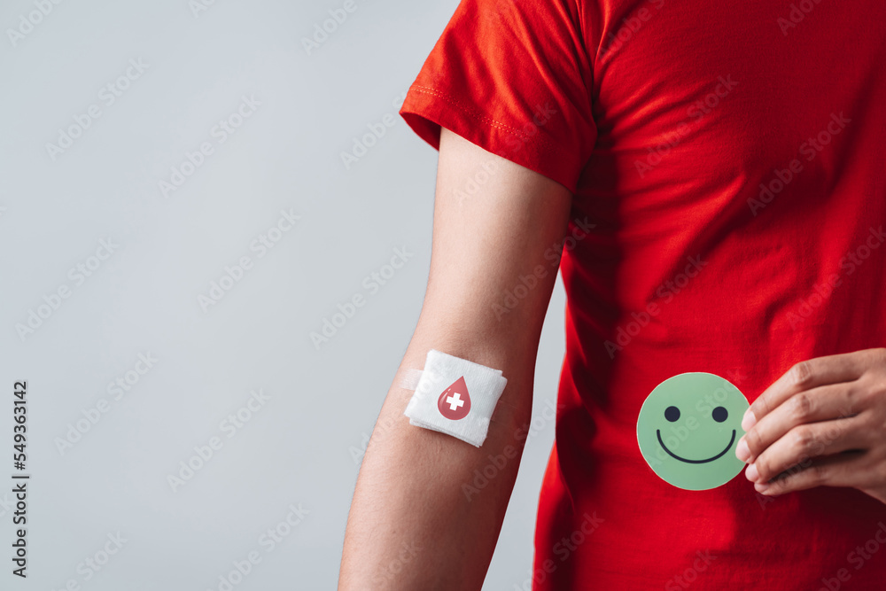 Wall mural man hands holding smile face after donation blood, blood transfusion, world blood donor day, world h