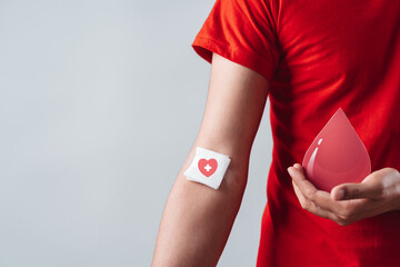 man hands holding donation blood paper cut, blood transfusion, world blood donor day, world...