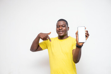 handsome Young African man holding smartphone mockup of blank screen and shows ok sign on white background