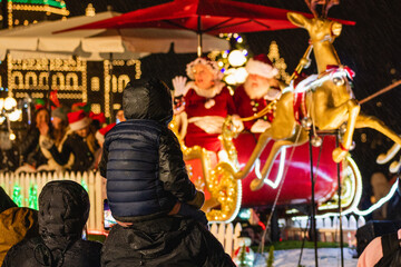 mr and mrs santa and a child