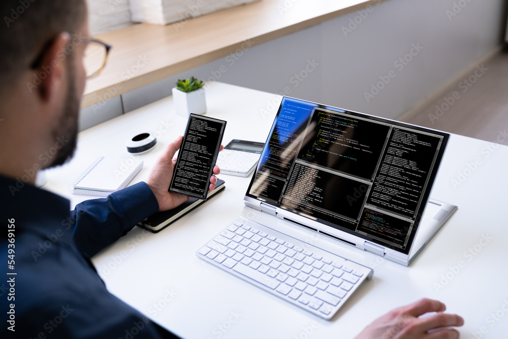 Poster Programmer Or Coder At Office Desk