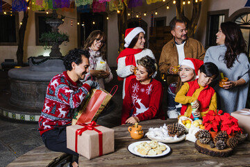 Mexican family in Christmas party at Mexico, Latin people in posada