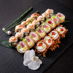 tasty sushi on the black background