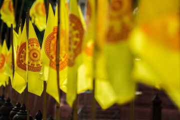 Fototapeta na wymiar Thai Buddhist flag,The dhammacakka flag, Thong Dhammacak