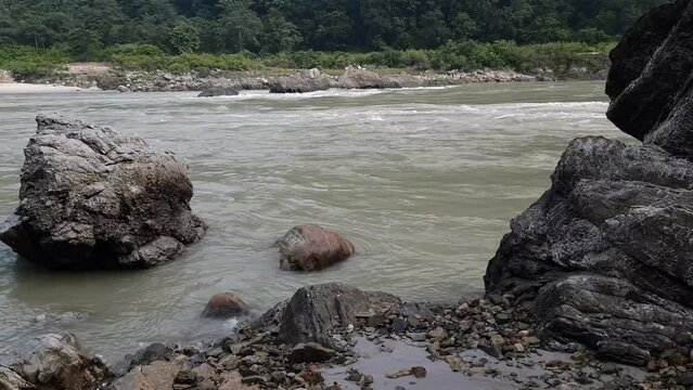 Morning view at GOA beach located in Rishikesh Uttarakhand near Laxman Jhula, Clean view of Ganga river at Rishikesh during early morning time, World famous GANGA river full view