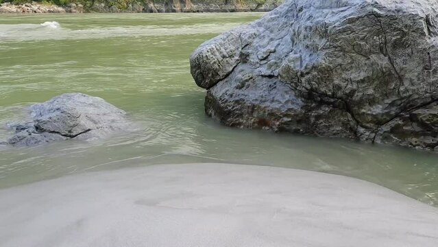 Morning view at GOA beach located in Rishikesh Uttarakhand near Laxman Jhula, Clean view of Ganga river at Rishikesh during early morning time, World famous GANGA river full view