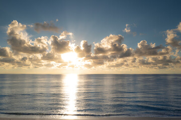 Obraz premium Sunrise sea on tropical beach. Landscape of beautiful beach. Beautiful sunset at sea. Ocean sunset on sky background with colorful clouds. Sunset over calm sea with beautiful sky.