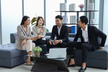 Business people relax meeting in office by using laptop computer and discussion or brainstorming