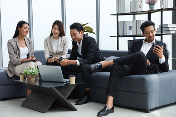 Business people relax meeting in office by using laptop computer and discussion or brainstorming