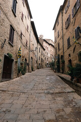 Fototapeta na wymiar Alley of a medieval town in Tuscany