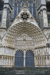 Bourges, medieval city in France, Saint-Etienne cathedral, main entry with saints statues
