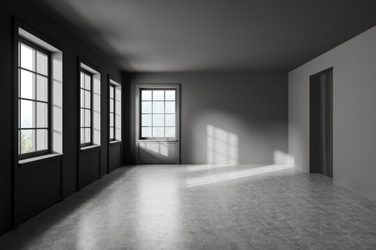 Side view on dark empty room interior with panoramic windows