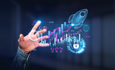 Businessman touching digital interface with holograms of rocket startup