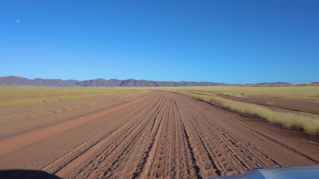 4x4 driving toward Purros. Kaokoveld red desert. Namibia, Africa.