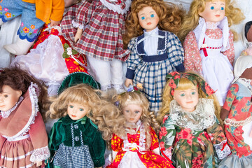 Old dolls placed in suitcase Antique toy, vintage dolls Handmade