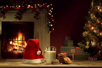 close up view of glass of milk with cookies on color back