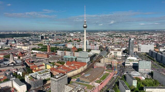 City of Berlin, Germany from above.Aerial view of cityscape showing architectural landmarks Fernsehturm TV Tower and Berlin Cathedral by day. Drone Flight over Alexanderplatz TV Tower, Sunflairs circa