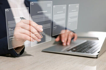 Concept of electronic signature. Woman working on laptop at table indoors, closeup