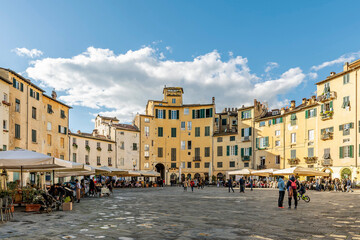 Fototapeta na wymiar The central Piazza Anfiteatro square in Lucca, Italy, on a sunny day