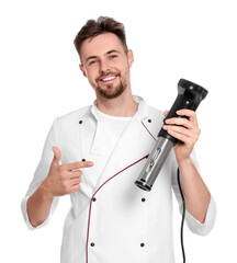 Smiling chef pointing on sous vide cooker against white background