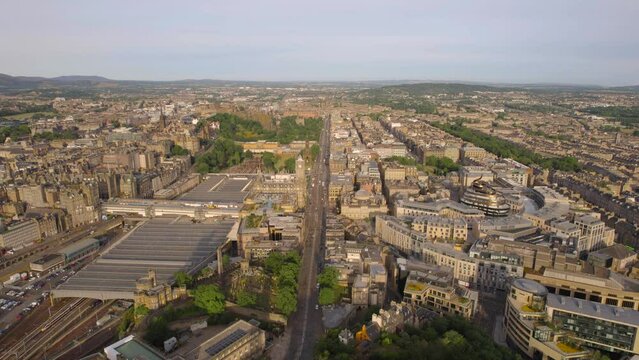 The drone aerial footage of the downtown district and Calton Hill in Edinburgh, Scotland.