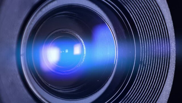 Close up of Camera Lens with Flare on Optical Glass. Process of Zooming Camera Lens