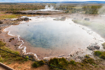 Geysir is a famous hot spring in the geothermal area of Haukadalur Valley in southwest Iceland.
