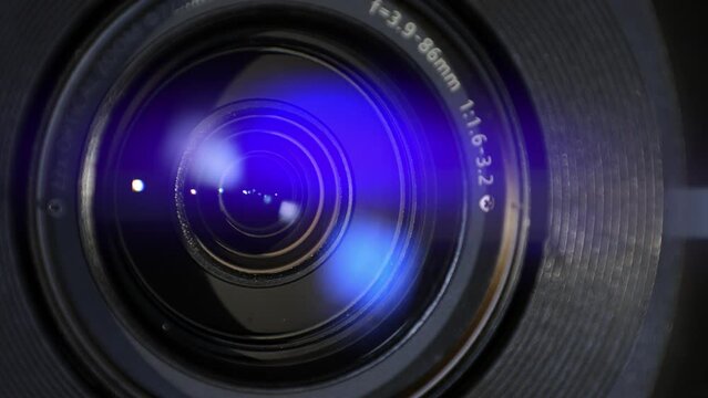 Close up of Camera Lens with Flare on Optical Glass. Process of Zooming Camera Lens