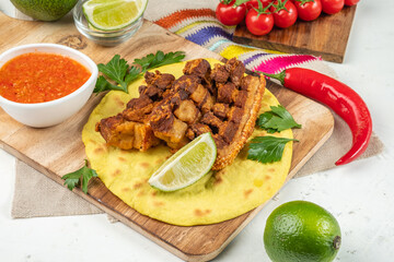 chicharones, crispy pieces of pork with a crispy skin, a Mexican-style beer hors d'oeuvre.