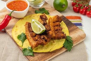 Appetizing appetizer of deep-fried pork skin, Chicharron.