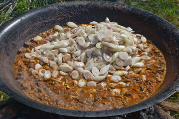 banana stik curry that is being cooked