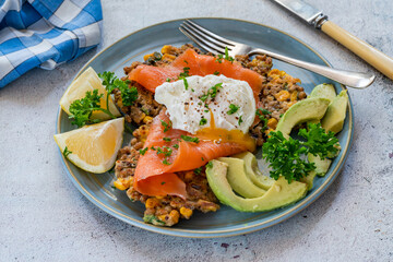 Corn and quinoa fritters with smoked salmon and poached egg