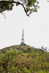 Torre no Pico do Papagaio - SAO PAULO, SP, BRAZIL - NOVEMBER 13, 2022: Antennas tower on  Papagaio Hill seen from the Pai Z&eacute; Trail, which leads to the peak of Jaragua, in the Jaragua State Park.