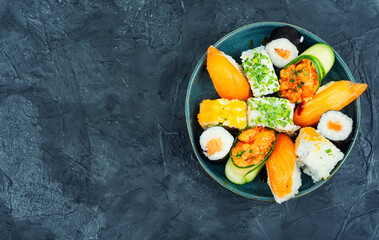 Assortment of oriental sushi roll, copy space