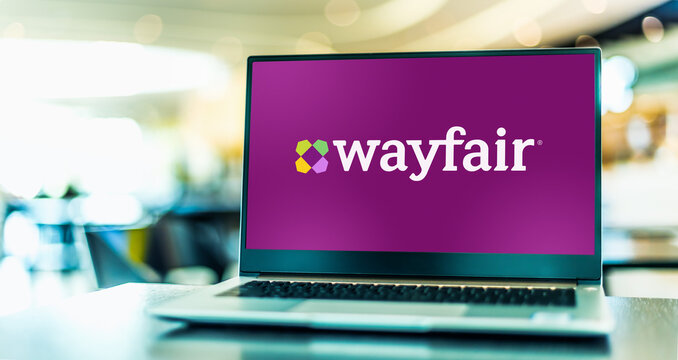 Laptop computer displaying logo of Wayfair