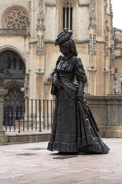 OVIEDO, SPAIN-AUGUST 10, 2021: Statue dedicated to La Regenta in front of Oviedo Cathedral (Sculptor: Mauro Alvarez Fernandez)