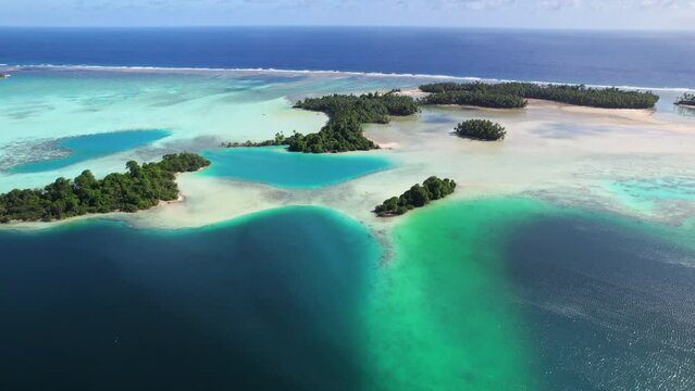 Aerial shot of tropical islands, lagoon and tidal channels.