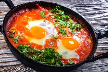 Shakshouka dish in a cast iron pan